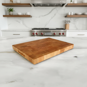 Cherry Wooden cutting board on a marble surface