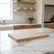Wooden cutting board on a white background