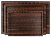 The Hawthorne set of 3 walnut end grain cutting boards is a best seller. The boards feature an arrowhead pattern providing an attractive and functional surface to cut and chop on. The end grain construction is gentle on knives and makes The Hawthorne a favourite among chefs. A staple kitchen accessory.