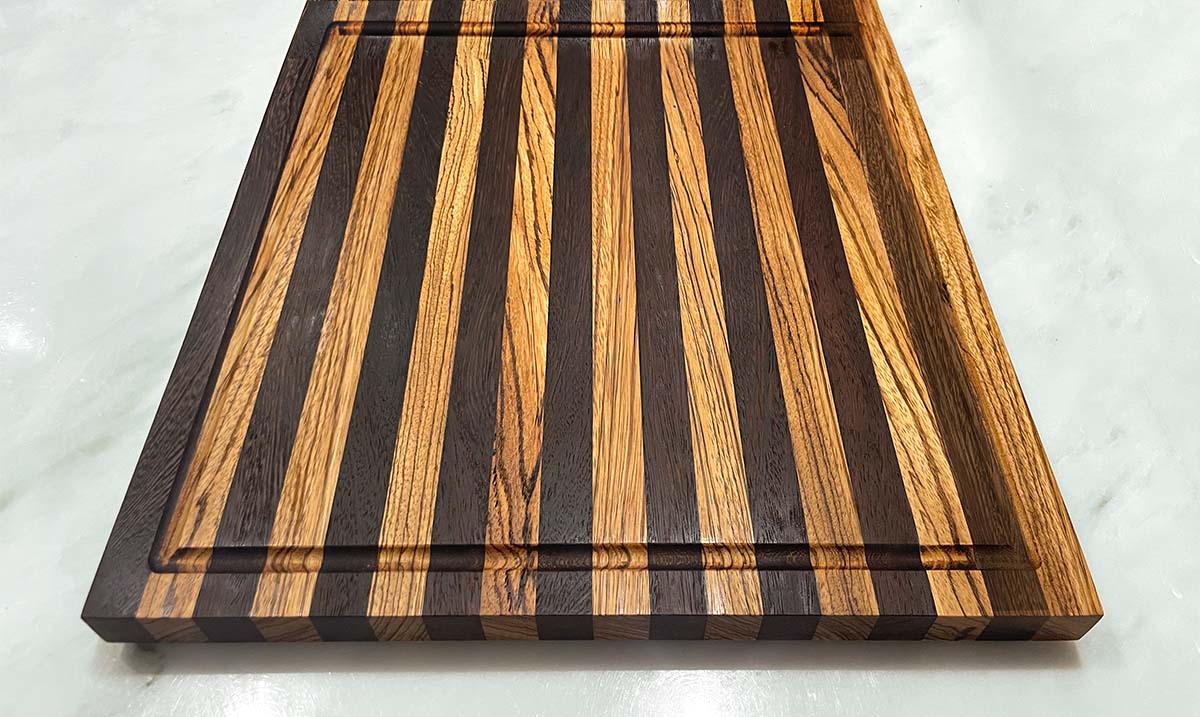 Zebrawood and Wenge Edge Grain Cutting Board "The Deer Park Crescent"